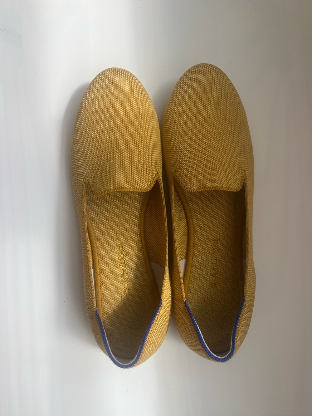Rothy's Slip-On Loafers in Mustard Yellow with Blue Trim